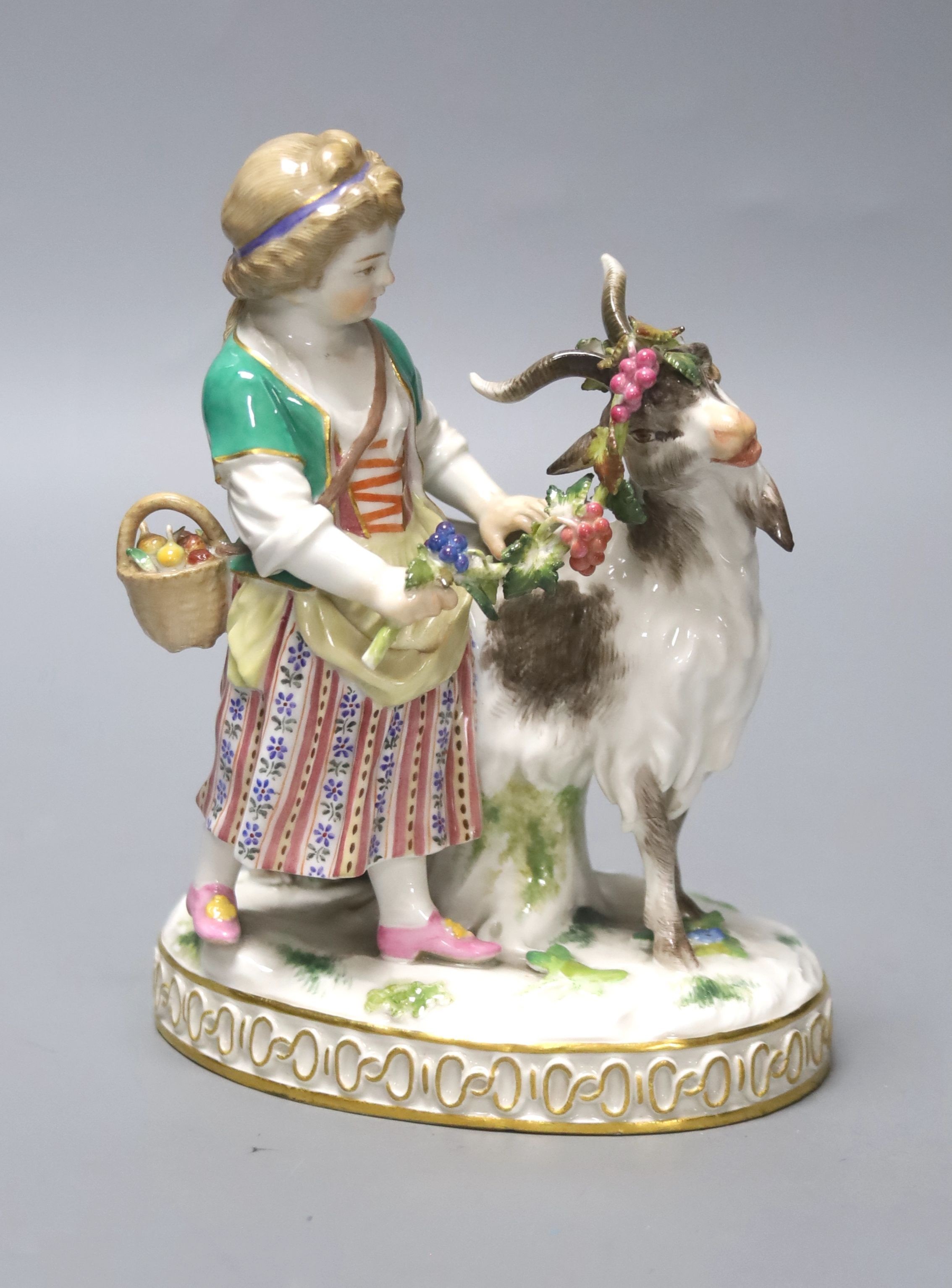 A late 19th/early 20th Meissen girl and goat group, model number H81, 15cm 15cm